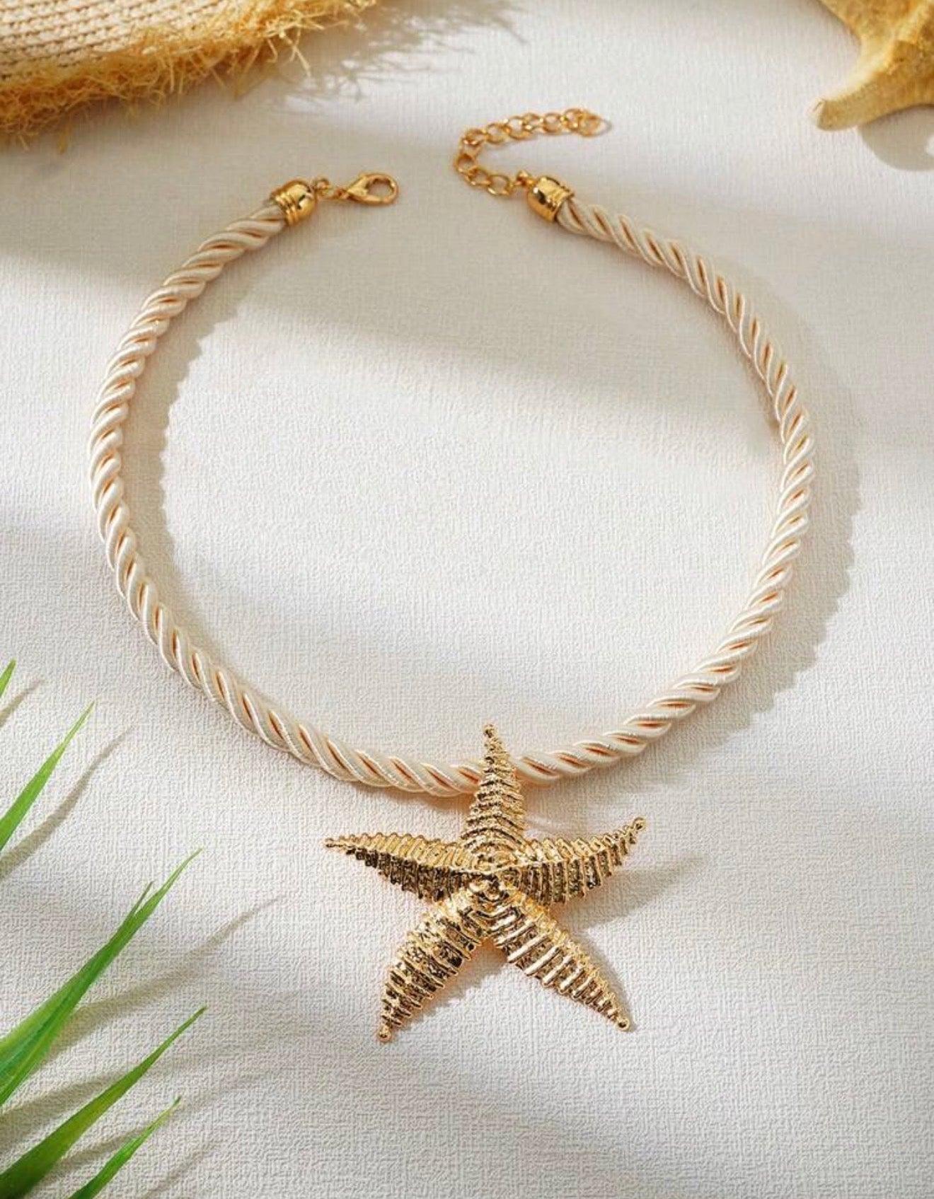 Gold starfish necklace